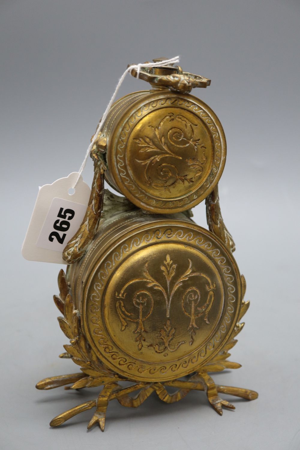 An ormolu desk timepiece and aneroid barometer, height 21cm